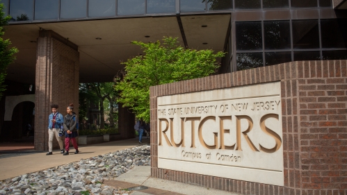 rutgers-camden campus sign in front of building