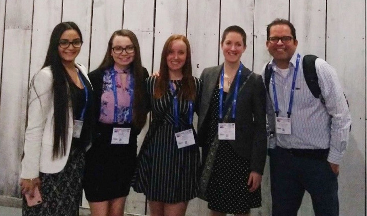 Rybacki, second from left, at the American Chemical Society 2019 National Meeting and Expo in Orlando