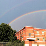 rainbow over a building
