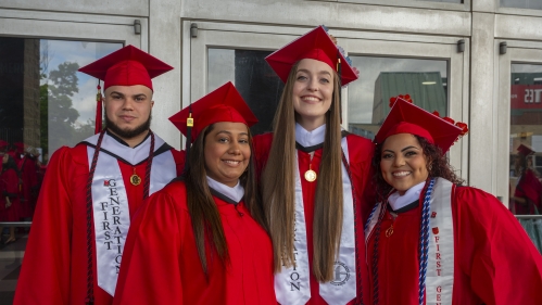 Commencement 2024 graduates in huddle