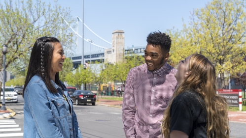 group of students laughing outside