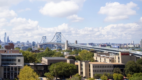 aerial shot of campus with ben franklin bridge in background
