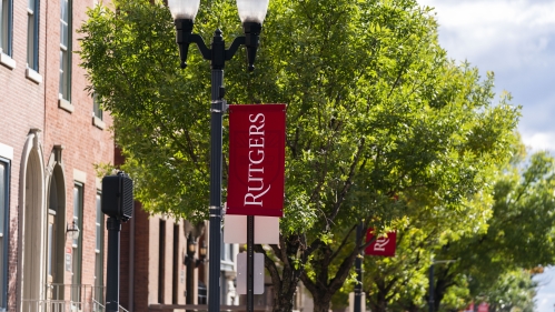 rutgers flag hanging from lamp pole