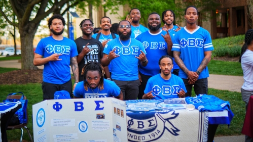 Greek Fraternity group showing their call sign
