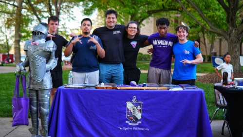 Greek Fraternity group showing their call sign