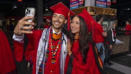 Commencement 2024 graduates taking selfie