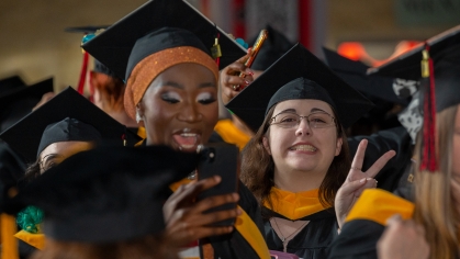 commencement 2023 peace out sign