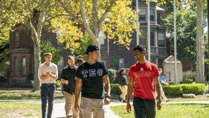 students walking along campus
