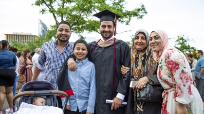 Graduate with his family