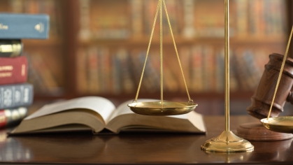 Scales of justice and law books.