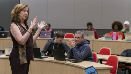 professor speaking in lecture hall