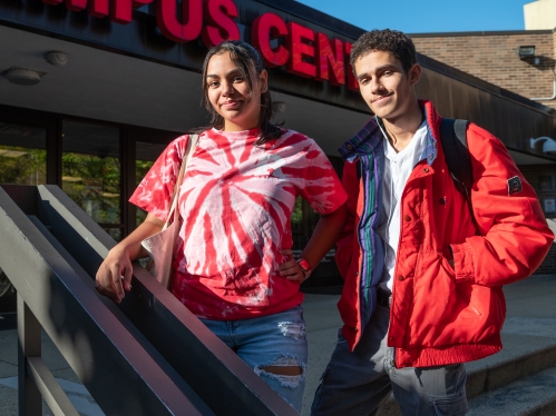 two students standing in front of the Student Center 