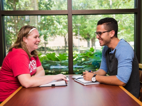 Students in Dining Hall tables