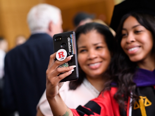 Student with family member taking a selfie