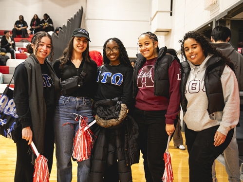 Group of Greek Sorority Sisters gathered in a group smiling
