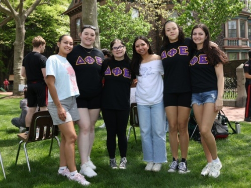 Sorority Sisters standing and holding hands