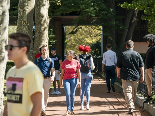 students walking toward Armitage Hall