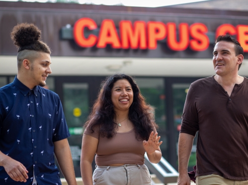 students talking and smiling outside the Campus Center