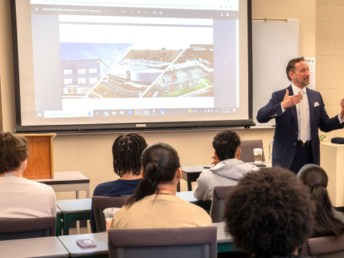 professor in classroom teaching 
