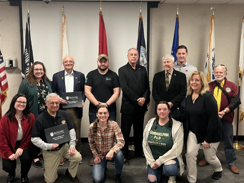 Office of Military & Veterans Affairs event celebration and group photo