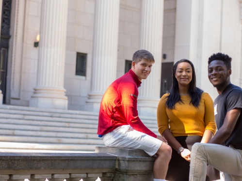 Trio of students in front of Johnson Park