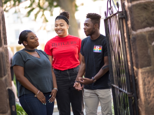 Students talking in front of the Admissions Building (Ayer Mansion)