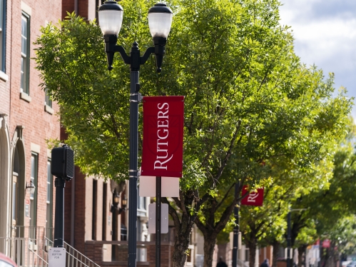 rutgers flag hanging from lamp pole