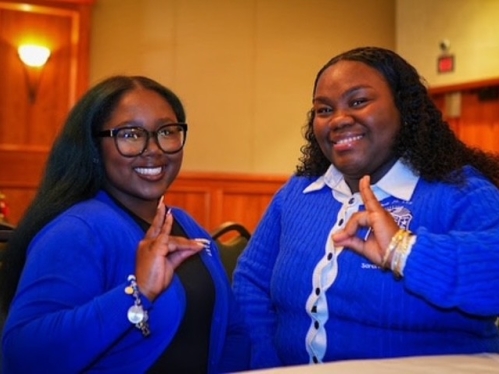 Sorority Sisters demonstrating their call sign