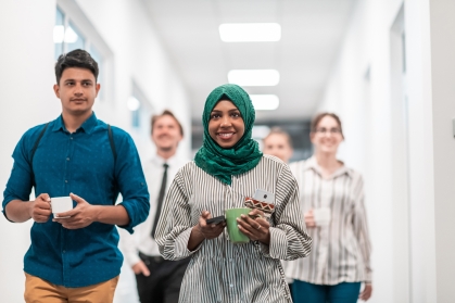 group walking down hall