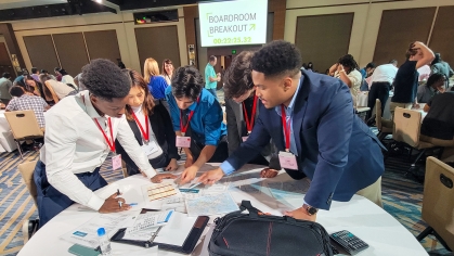 Rutgers–Camden students work together during a breakout session during the 2025 Deloitte MADE Conference