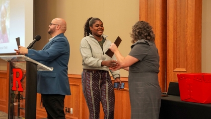 A student receieves her award during the 2024 Raptor Rising Star Awards Ceremony