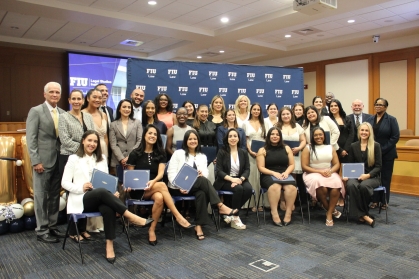 FIU law students with interim dean Michelle D. Mason