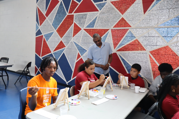 Children participate in an art class.
