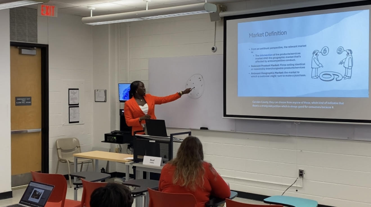 Diallo teaching an antitrust class to undergraduates at Rutgers School of Business–Camden.