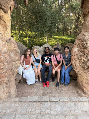 A group of students relaxes while exploring Barcelona.