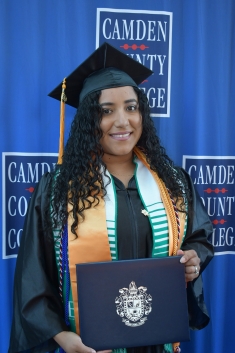 Alexandra Rios celebrates receiving her degree from Camden County Community College.