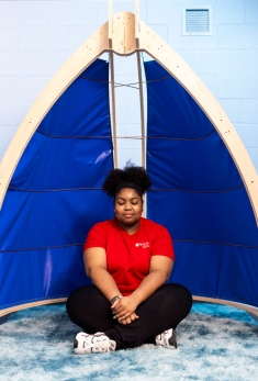 Kayla Daley reflects while sitting in the meditation pod